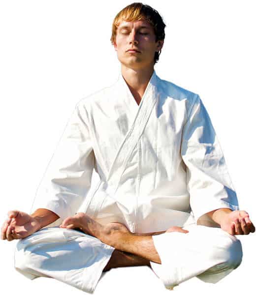 Martial Arts Lessons for Adults in Cypress TX - Young Man Thinking and Meditating in White